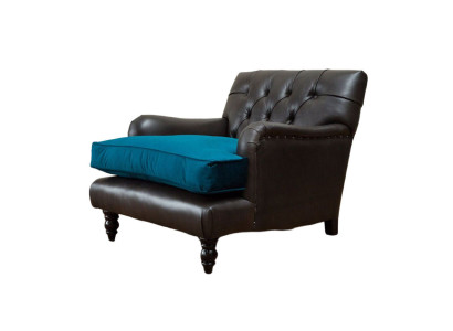 Sillón Chesterfield de 1 plaza en cuero gris.