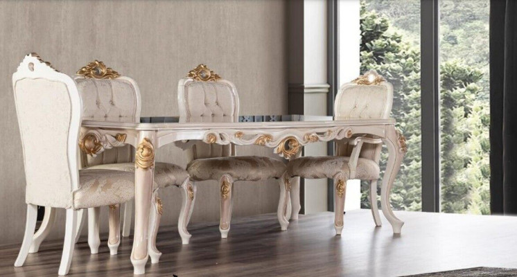 Grupo de 4 sillas de comedor de madera estilo muebles.