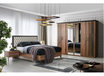 Cama doble completa con mesitas de noche marrones de 4 piezas en el dormitorio.
