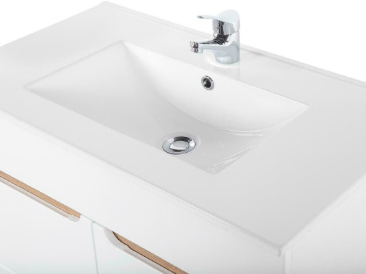 Lavabo blanco con armario de alta calidad.