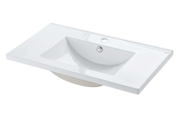 Lavabo empotrado de cerámica blanco.