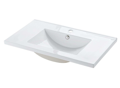 Lavabo empotrado de cerámica blanco.