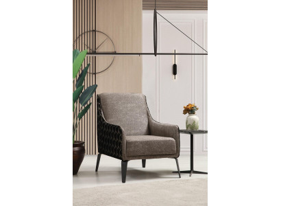 Sillón orejero de tela gris, tapizado, de una plaza.