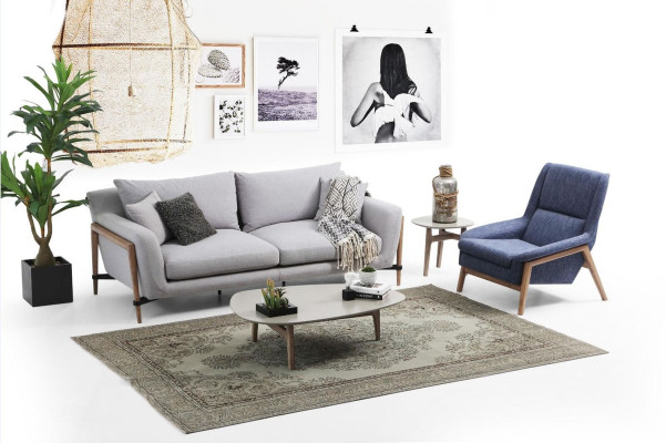 Sofá de 4 plazas de tela de diseño moderno en color gris.