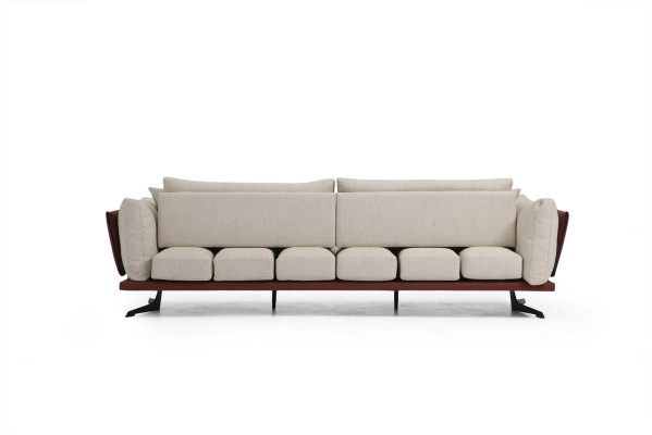 Sofá de cuatro plazas tapizado en tela de color beige con diseño moderno de lujo para la sala de estar.