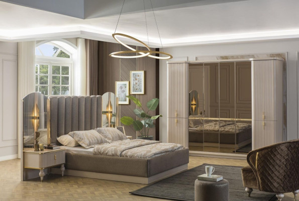 Dormitorio de lujo cama doble de diseñador armario mesitas de noche