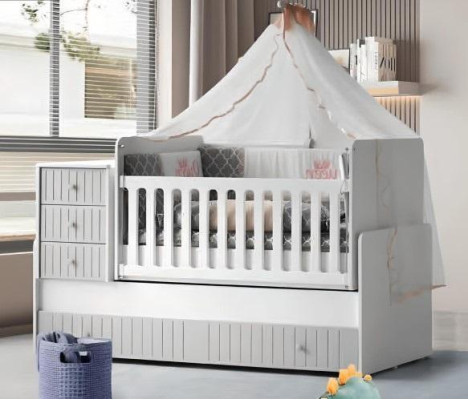 Elegante cama infantil acogedora para un sueño reparador de lujo gris.