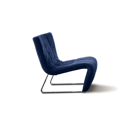 Sillón sin apoyabrazos, diseño de lujo tapizado en estilo italiano con tela azul.