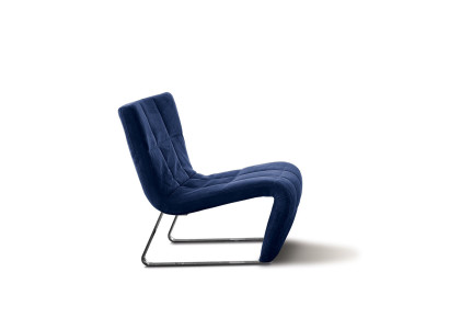 Sillón sin apoyabrazos, diseño de lujo tapizado en estilo italiano con tela azul.