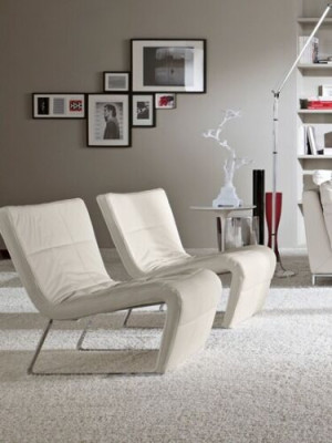 Sillón sin apoyabrazos, diseño de lujo tapizado en estilo italiano con tela azul.