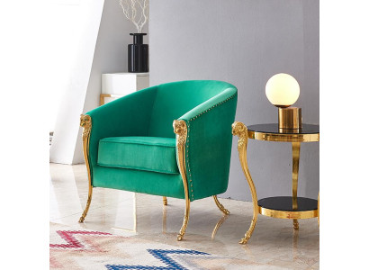 Sillón de lujo verde con tapizado de muebles de oro en el salón. Nuevo de una plaza.