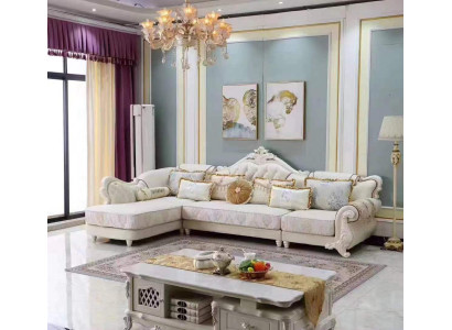 Sofá de esquina grande y clásico en blanco con elementos de madera hechos a mano