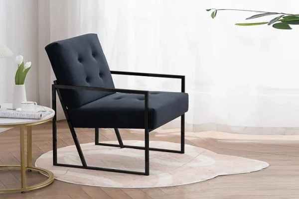 Acogedor sillón negro en textil nuevo de alta calidad de metal.