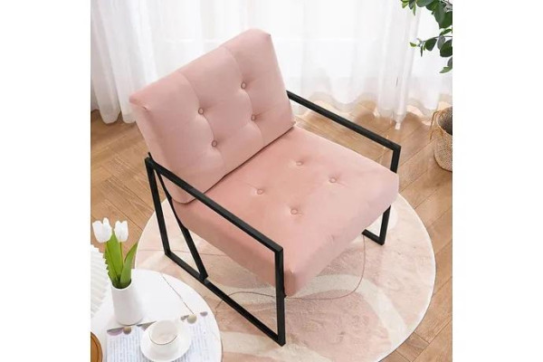 Cómodo sillón de 1 plaza para sala de estar en rosa con tapizado textil y patas de metal.