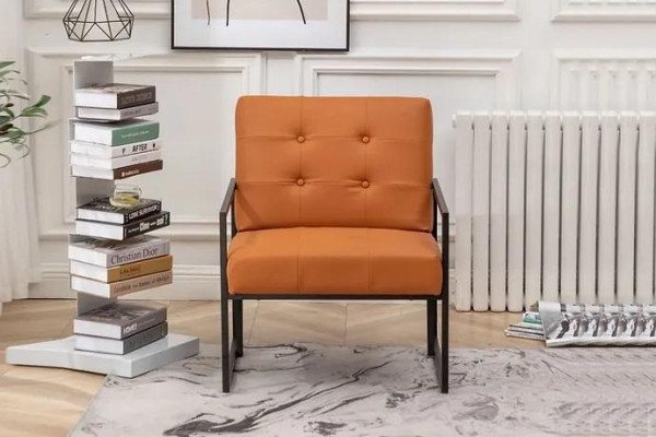 Sillón de sala naranja. Nuevas piernas de metal de lujo. Tapizado textil.