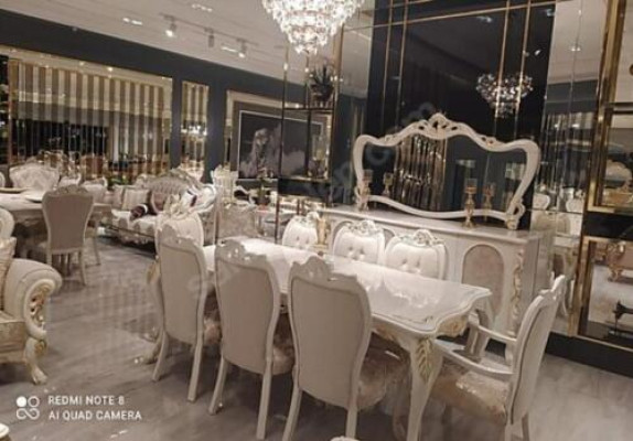 Conjunto de comedor clásico y elegante de 10 piezas exclusivo de madera maciza.