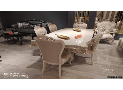 Juego de comedor clásico de marfil con elegante mesa de comedor y x6 sillas Chesterfield tapizadas.