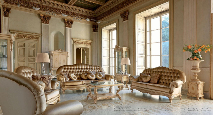 Sillón Chesterfield con orejas de una plaza tapizado en tela color beige para la sala de estar.
