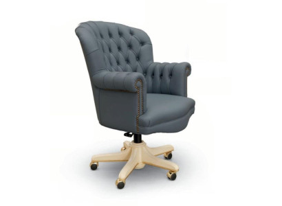 Silla giratoria de lujo Chesterfield azul para la oficina.