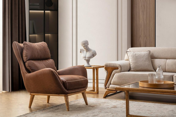 Sillón exclusivo color marrón, elegante mobiliario de cuero artificial.