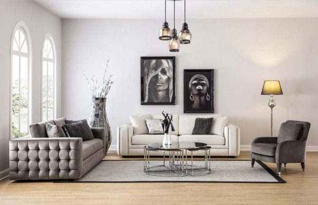 Clásico sofá Chesterfield de tres plazas en beige, mueble de lujo.