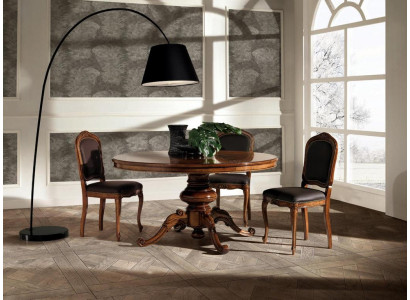 Mesa de comedor redonda de lujo en madera maciza de Italia.
