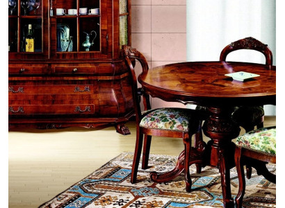 Mesa de comedor redonda extensible de lujo de madera italiana.