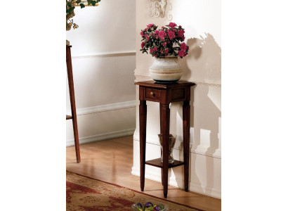 Soporte de flores de madera en color marrón con cajón y estante.