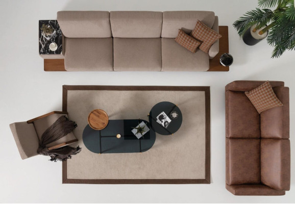 Sillón individual de tela gris nuevo de diseño acolchado.