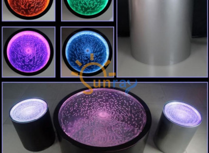 Tabla auxiliar redonda LED con iluminación para agua en la pared.