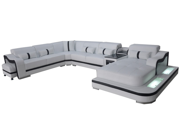 Sofá esquinero de cuero acolchado de diseño moderno en forma de U.