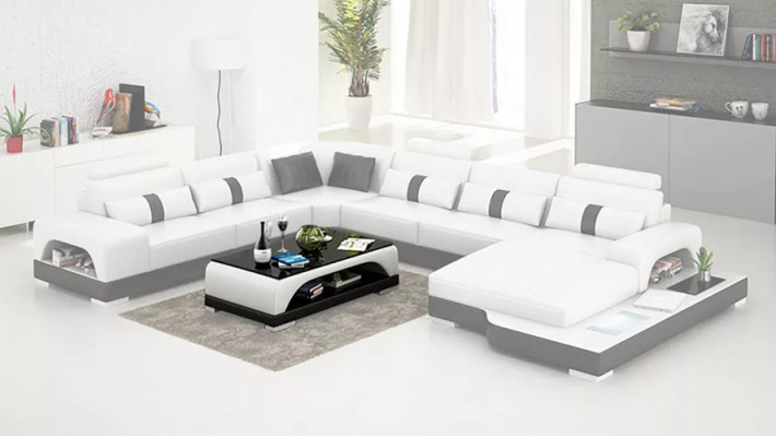 Moderno sofá esquinero en forma de U, mesa de centro, sofá de cuero esquinero, tapizado en naranja de lujo.