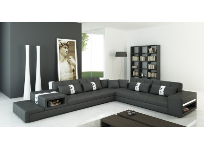 Moderna sensación de vivienda sofá esquinero en forma de L en gris oscuro con elegante tapizado de cuero sintético.