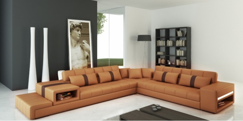 Moderna sensación de vivienda sofá esquinero en forma de L en gris oscuro con elegante tapizado de cuero sintético.