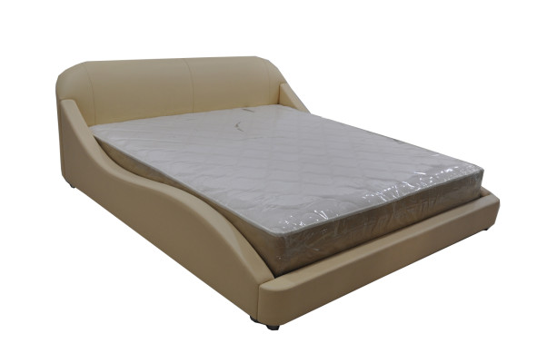 Nueva, moderna y cómoda cama para el dormitorio.