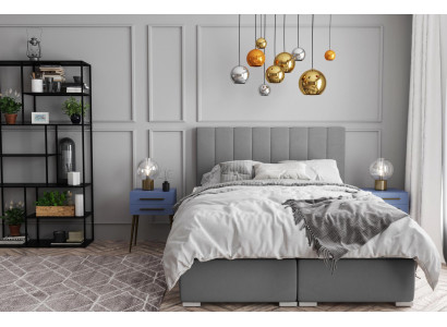 Cama Boxspring doble de hotel con diseño de caja tapizada y función de color gris.