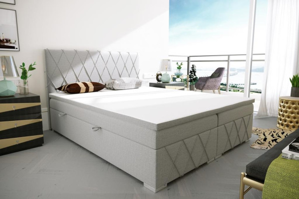 Cama de muelles tapizada doble de hotel de lujo con función de almacenamiento en tela.