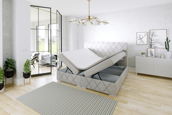 Cama de muelles tapizada doble de hotel de lujo con función de almacenamiento en tela.