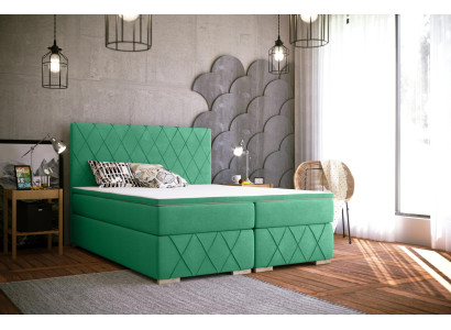 Conjunto completo de cama boxspring con colchón y cubrecolchón de lujo en textil tapizado.