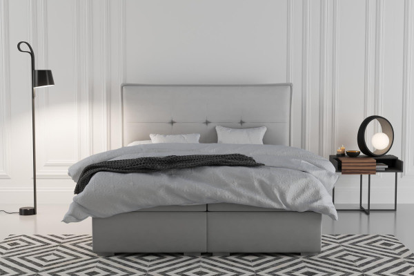 Cama de muelles con somier tapizado doble de hotel en tela gris de lujo con función de cajón de almacenamiento.