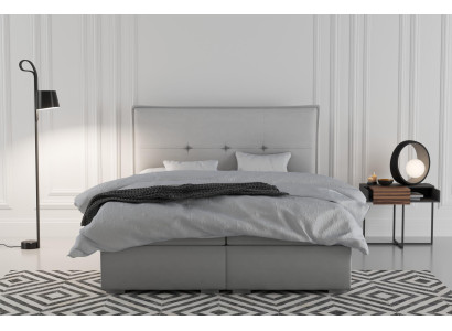 Cama de muelles con somier tapizado doble de hotel en tela gris de lujo con función de cajón de almacenamiento.