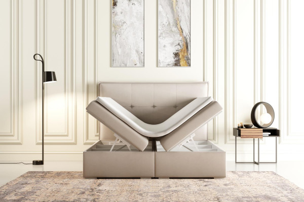 Cama de muelles con somier tapizado doble de hotel en tela gris de lujo con función de cajón de almacenamiento.