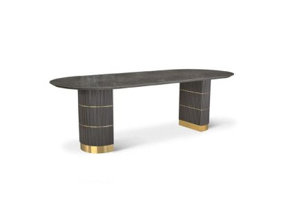 Mesa de comedor de diseñador gris con patas de metal y estructura de madera.