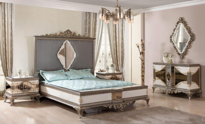 Conjunto de dormitorio clásico de alta calidad con cama doble, cómoda y sofá.