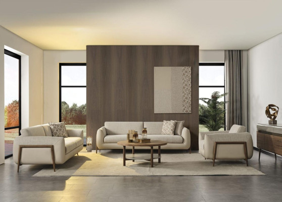 Sofá completo beige de tela para sala de estar.
