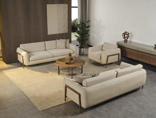 Sofá completo beige de tela para sala de estar.
