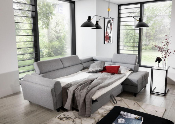 Conjunto de sofá en forma de L con sillón moderno y tapizado textil.