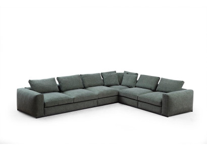 Sofá esquinero en forma de L de madera con textil. Sofá moderno nuevo de color verde.