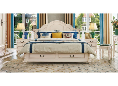 Increíble conjunto de dormitorio con cama y mesitas de noche en blanco.