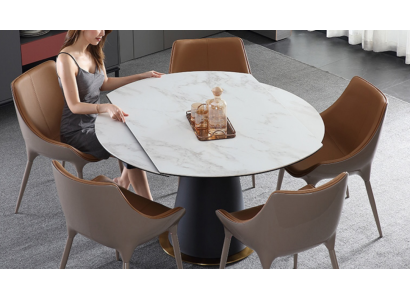 Una elegante mesa redonda de comedor para su comedor en estilo moderno